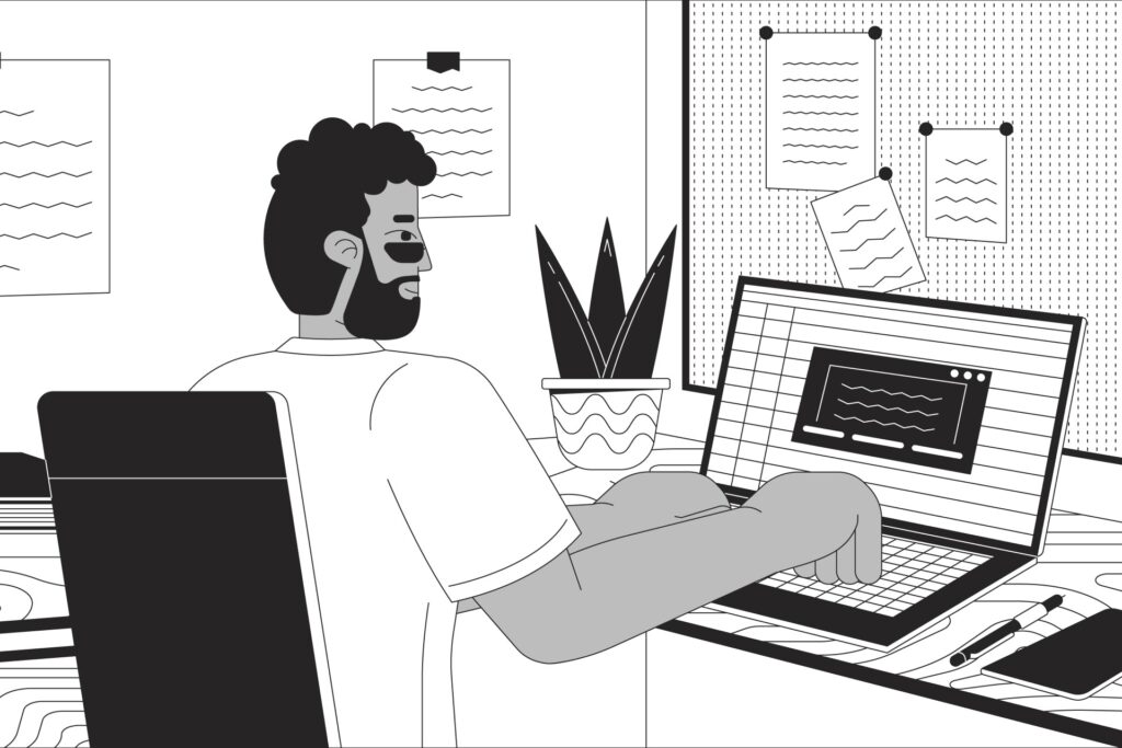 Man Working on a Computer to Complete Targets